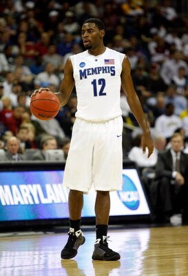 KANSAS CITY, MO - MARCH 21:  Tyreke Evans #12 of the Memphis Tigers looks to set up the play on the dribble during their second round game against the Maryland Terrapins in the NCAA Division I Men's Basketball Tournament at the Sprint Center on March 21, 