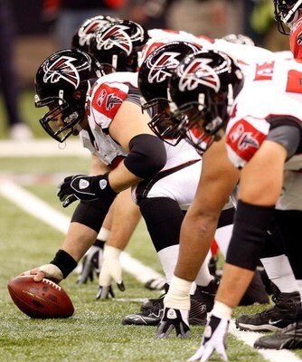 NEW ORLEANS - DECEMBER 07:  Todd McClure #62 of the Atlanta Falcons readies the snap the ball against the New Orleans Saints on December 7, 2008 at the Superdome in New Orleans, Louisiana.  (Photo by Chris Graythen/Getty Images)