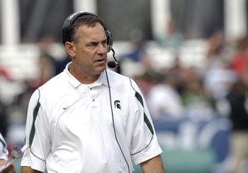 ORLANDO, FL - JANUARY 1: Coach Mark Dantonio of the Michigan State Spartans directs play against the Georgia Bulldogs at the 2009 Capital One Bowl at the Citrus Bowl on January 1, 2009 in Orlando, Florida.  (Photo by Al Messerschmidt/Getty Images) 