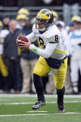 COLUMBUS, OH - NOVEMBER 22: Quarterback Nick Sheridan #8 of the Michigan Wolverines runs the ball during the Big Ten Conference game against the Ohio State Buckeyes at Ohio Stadium on November 22, 2008 in Columbus, Ohio.  (Photo by Andy Lyons/Getty Images