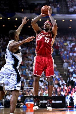 ORLANDO, FL - MAY 24:  LeBron James #23 of the Cleveland Cavaliers shoots against Rashard Lewis #9 of the Orlando Magic in Game Three of the Eastern Conference Finals during the 2009 NBA Playoffs at the the Amway Arena on May 24, 2009 in Orlando, Florida.