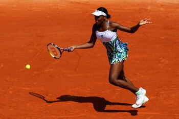 PARIS - MAY 25:  Venus Williams of USA hits a forehand during her Women's Singles First Round match against Bethanie Mattek-Sands of USA at the French Open at Roland Garros on May 25, 2009 in Paris, France.  (Photo by Matthew Stockman/Getty Images)
