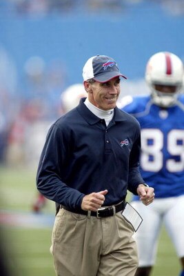 ORCHARD PARK, NY - AUGUST 26:  Head coach Dick Jauron of the Buffalo Bills jogs on the field prior to the preseason game against the Cleveland Browns on August 26, 2006 at Ralph Wilson Stadium in Orchard Park, New York. The Browns won 20-17.  (Photo by Ri