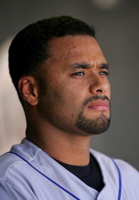 SAN FRANCISCO - MAY 16:  Johan Santana #57 of the New York Mets stands in the dugout during the seventh inning strech of their game against the San Francisco Giants at AT&T Park on May 16, 2009 in San Francisco, California.  The Mets won 9-6.  (Photo by E