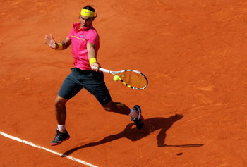 PARIS - MAY 25:  Rafael Nadal of Spain hits a forehand during his Men's Singles First Round match against Marcos Daniel of Brazil at the French Open at Roland Garros on May 25, 2009 in Paris, France.  (Photo by Matthew Stockman/Getty Images)