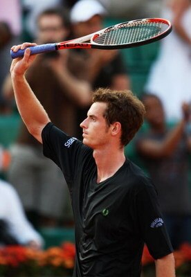 PARIS - MAY 24:  Andy Murray of Great Britain celebrates victory after his Men's Singles First Round match against Juan Ignacio Chela of Argentina at the French Open on May 24, 2009 in Paris, France.  (Photo by Clive Brunskill/Getty Images)