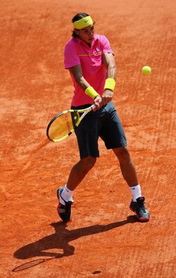 PARIS - MAY 25:  Rafael Nadal of Spain hits a backhand during his Men's Singles First Round match against Marcos Daniel of Brazil at the French Open at Roland Garros on May 25, 2009 in Paris, France.  (Photo by Matthew Stockman/Getty Images)