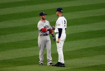 NEW YORK - MAY 05:  Derek Jeter #2 of the New York Yankees talks with Dustin Pedroia #15 of the Boston Red Sox prior to their game on May 5, 2009 at Yankee Stadium in the Bronx borough of New York City.  (Photo by Jim McIsaac/Getty Images)