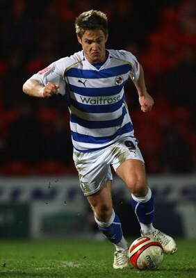 DONCASTER, UNITED KINGDOM - MARCH 17:  Kevin Doyle of Reading runs with the ball during the Coca-Cola Championship match between Doncaster Rovers and Reading at the Keepmoat Stadium on March 17, 2009 in Doncaster, England.  (Photo by Matthew Lewis/Getty I
