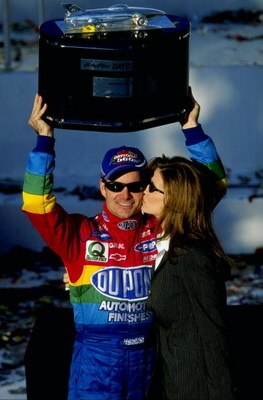 14 Feb 1999:  Jeff Gordon #24 celebrates with wife Brooke after winning the NASCAR Daytona 500 at the Daytona International Speedway in Daytona, Florida. Mandatory Credit: Jamie Squire  /Allsport