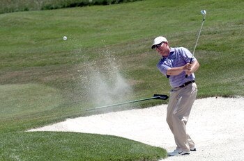 UNITED STATES - MAY 28:  Justin Leonard hits out of a bunker on the 6th hole during Round Three of The Fedex St. Jude Classic at TPC @ Southwind in Memphis, Tennessee on May 28, 2005.  (Photo by Joe Murphy/Getty Images)