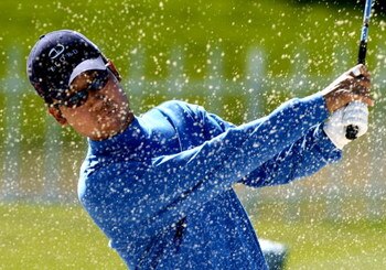 UNITED STATES - MARCH 10:  Kevin Na works on his sand game after first round competition at the 2005 Honda Classic March 10, 2005 in Palm Beach Gardens, Florida.  (Photo by Al Messerschmidt/Getty Images)