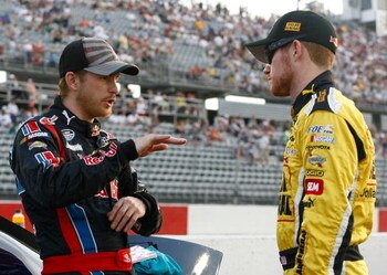 DARLINGTON, SC - MAY 08:  Brian Vickers (R), driver of the #32 Dollar General Toyota, talks with Scott Speed, driver of the #99 Red Bull Toyota, on the grid prior to the NASCAR Nationwide Series Diamond Hill Plywood 200 on May 8, 2009 at Darlington Racewa