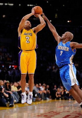 LOS ANGELES, CA - MAY 21:  Derek Fisher #2 of the Los Angeles Lakers shoots a jumper over Chauncey Billups #7 of the Denver Nuggets in Game Two of the Western Conference Finals during the 2009 NBA Playoffs at Staples Center on May 21, 2009 in Los Angeles,