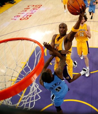 LOS ANGELES, CA - APRIL 27:  Lamar Odom #7 of the Los Angeles Lakers goes up for a shot over Ronnie Brewer #9 of the Utah Jazz in the first half of Game Five of the Western Conference Quarterfinals during the 2009 NBA Playoffs at Staples Center on April 2