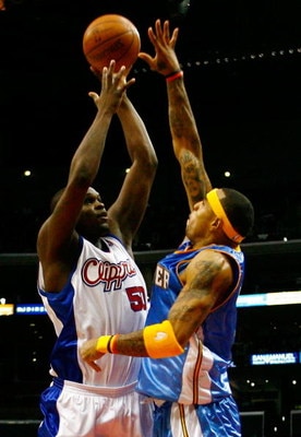LOS ANGELES, CA - NOVEMBER 26:  Zach Randolph #50 of the Los Angeles Clippers shoots over Kenyon Martin #4 of the Denver Nuggets during the second half at Staples Center on November 26, 2008 in Los Angeles, California. The Nuggets defeated the Clippers 10