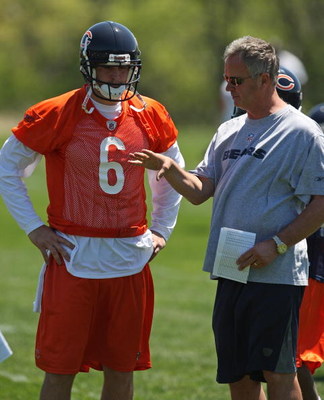 LAKE FOREST, IL - MAY 20: Jay Cutler #6 of the Chicago Bears and offensive coordinator Ron Turner discuss a play during an organized team activity (OTA) practice on May 20, 2009 at Halas Hall in Lake Forest, Illinois. (Photo by Jonathan Daniel/Getty Ima