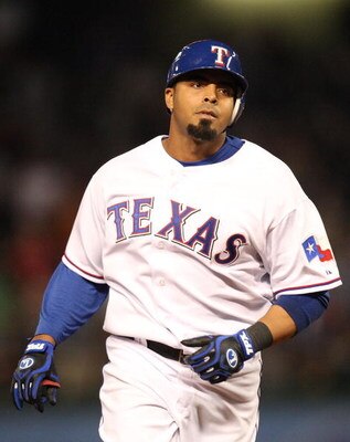 ARLINGTON, TX - APRIL 15:  Nelson Cruz of the Texas Rangers runs after hitting a grandslam while wearing jersey #42 to commemorate Jackie Robinson day during a game against the Baltimore Orioles on April 15, 2009 at Rangers Ballpark in Arlington, Texas.  
