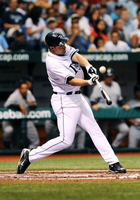ST. PETERSBURG, FL - APRIL 15: Shortstop Jason Bartlett #8 of the Tampa Bay Rays bats against the New York Yankees at Tropicana Field on April 15, 2009 in St. Petersburg, Florida.  (Photo by Al Messerschmidt/Getty Images)