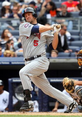 NEW YORK - MAY 17:  Michael Cuddyer #5 of the Minnesota Twins bats against the New York Yankees on May 17, 2009 at Yankee Stadium in the Bronx borough of New York City. The Yankees defeated the Twins 3-2 in ten innings.  (Photo by Jim McIsaac/Getty Images
