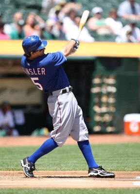 OAKLAND, CA - MAY 07:  Ian Kinsler #5 of the Texas Rangers bats against the Oakland Athletics during a Major League Baseball game on May 7, 2009 at the Oakland Coliseum in Oakland, California.  (Photo by Jed Jacobsohn/Getty Images)