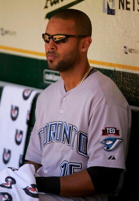 OAKLAND, CA - MAY 09:  Alex Rios #15 of the Toronto Blue Jays sits in the dugout before their game against the Oakland Athletics on May 9, 2009 at the Oakland Coliseum in Oakland, California.  (Photo by Ezra Shaw/Getty Images)