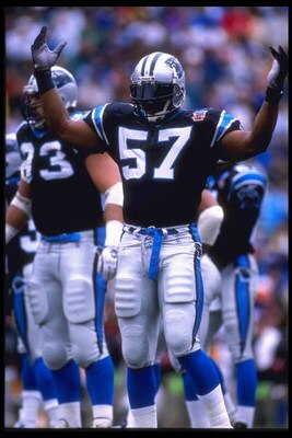 17 Dec 1995:  Linebacker Lamar Lathon #57 of the Carolina Panthers raises his arms to the sideline after the play against the Atlanta Falcons at Memorial Stadium in Clemson, South Carolina. The Panthers defeated the Falcons 21-17.  Mandatory Credit:  Crai