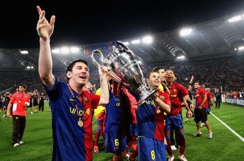 ROME - MAY 27:  Lionel Messi of Barcelona lifts the trophy as he and his team mates celebrates winning the UEFA Champions League Final match between Barcelona and Manchester United at the Stadio Olimpico on May 27, 2009 in Rome, Italy. Barcelona won 2-0. 