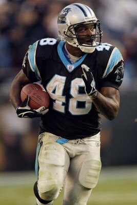 CHARLOTTE, NC - NOVEMBER 16:  Running back Stephen Davis #48 of the Carolina Panthers carries the ball against the Washington Redskins during the game at Ericsson Stadium on November 16, 2003 in Charlotte, North Carolina.  The Panthers defeated the Redski