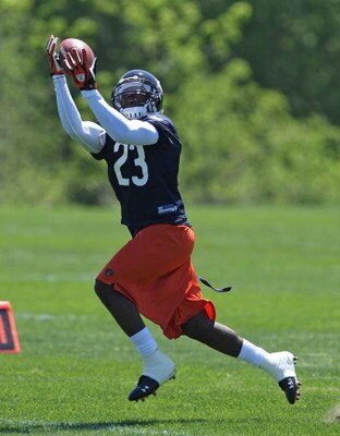 LAKE FOREST, IL - MAY 20: Devin Hester #23 of the Chicago Bears leaps to catch a pass during an organized team activity (OTA) practice on May 20, 2009 at Halas Hall in Lake Forest, Illinois. (Photo by Jonathan Daniel/Getty Images)