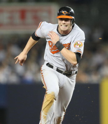 NEW YORK - MAY 21: Nolan Reimold #14 of the Baltimore Orioles runs the bases against the New York Yankees on May 21, 2009 at Yankee Stadium in the Bronx borough of New York City. (Photo by Nick Laham/Getty Images)