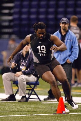 INDIANAPOLIS, IN - FEBRUARY 21:  Offensive lineman Xavier Fulton of Illinois runs in practice drills during the NFL Scouting Combine presented by Under Armour at Lucas Oil Stadium on February 21, 2009 in Indianapolis, Indiana. (Photo by Scott Boehm/Getty 
