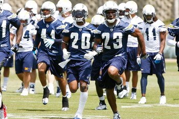 SAN DIEGO - MAY 03: Cornerbacks Antoine Cason #20 and Quentin Jammer #23 of the San Diego Chargers run wind sprints during minicamp at the Chargers training facility on May 3, 2009 in San Diego, California. (Photo by Kevin Terrell/Getty Images)