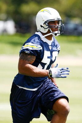 SAN DIEGO - MAY 03: Linebacker Larry English #52 of the San Diego Chargers runs upfield in pursuit during minicamp practice at the team's training facility on May 3, 2009 in San Diego, California. (Photo by Kevin Terrell/Getty Images)