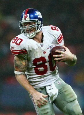 LONDON - OCTOBER 28:  Giants Tight End, Jeremy Shockey #80 carries the ball during the NFL Bridgestone International Series match between New York Giants and  Miami Dolphins at Wembley Stadium on October 28, 2007 in London, England. This is the first ever