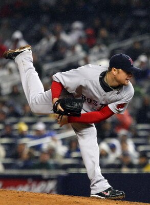 NEW YORK - MAY 04:  Jon Lester #31 of the Boston Red Sox deals a pitch against the New York Yankees on May 4, 2009 at Yankee Stadium in the Bronx borough of New York City.  (Photo by Jim McIsaac/Getty Images)