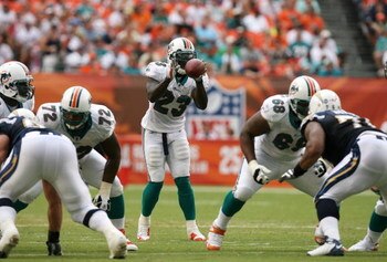 MIAMI - OCTOBER 05:  Running back Ronnie Brown #23 of the Miami Dolphins takes a direct snap while taking on the San Diego Chargers at Dolphin Stadium on October 5, 2008 in Miami, Florida. The Dolphins defeated the Chargers 17-10.  (Photo by Doug Benc/Get