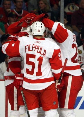 CHICAGO - MAY 22:  Valtteri Filppula #51 of the Detroit Red Wings celebrates with his teammates after Jonathan Ericcson #52 scored a goal in the second period against the Chicago Blackhawks during Game Three of the Western Conference Championship Round of