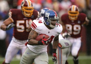 LANDOVER, MD - NOVEMBER 30:  Derrick Ward #34 of the New York Giants runs with the ball against the Washington Redskins during their game at FedEx Field on November 30, 2008 in Landover, Maryland.  (Photo by Streeter Lecka/Getty Images)