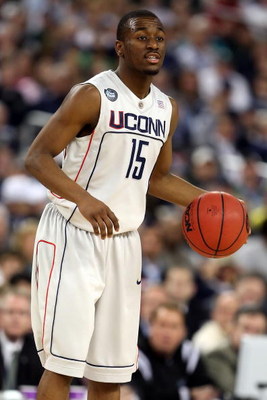 DETROIT - APRIL 04: Kemba Walker #15 of the Connecticut Huskies moves the ball against the Michigan State Spartans during the National Semifinal game of the NCAA Division I Men's Basketball Championship at Ford Field on April 4, 2009 in Detroit, Michigan