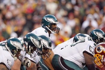 LANDOVER, MD - DECEMBER 21:  Quarterback Donovan McNabb #5 of the Philadelphia Eagles calls the play at the line of scrimmage during the game against the Washington Redskins on December 21, 2008 at FedEx Field in Landover, Maryland.  (Photo by Kevin C. Co