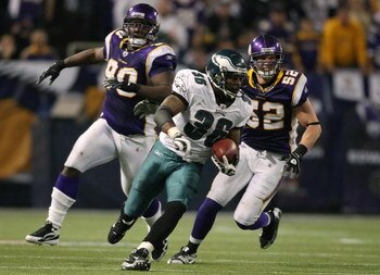 MINNEAPOLIS - JANUARY 04:   Brian Westbrook #36 of the Philadelphia Eagles carries the ball for a 71 yard touchdown as Fred Evans #90 and Chad Greenway #52 of the Minnesota Vikings defend during the NFC Wild Card playoff game on January 4, 2009 at the Hub