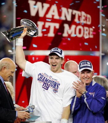 GLENDALE, AZ - FEBRUARY 03:  Quarterback Eli Manning #10 of the New York Giants holds the Vince Lombardi Trophy after defeating the New England Patriots 17 0 14 after Super Bowl XLII on February 3, 2008 at the University of Phoenix Stadium in Glendale, Ar
