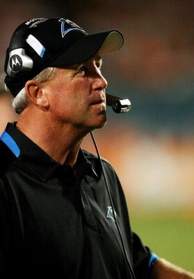 MIAMI - AUGUST 22:  Head coach John Fox of the Carolina Panthers watches his team from the sidelines while taking on the Miami Dolphins during a pre-season game at Land Shark Stadium on August 22, 2009 in Miami, Florida. The Dolphins defeated the Panthers