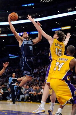 LOS ANGELES, CA - APRIL 21:  Deron Williams #8 of the Utah Jazz goes up for a shot against Pau Gasol #16 of the Los Angeles Lakers in the first half of Game Two of the Western Conference Quarterfinals during the 2009 NBA Playoffs at Staples Center on Apri