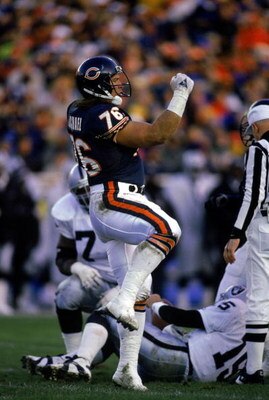 CHICAGO - NOVEMBER 7:  Steve McMichael #76 of the Chicago Bears celebrates during the game against the Los Angeles Raiders on November 7, 1993 in Chicago, Illinois. The Raiders won 16-14. (Photo by Jonathan Daniel/Getty Images)