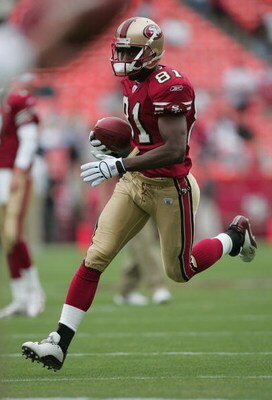 SAN FRANCISCO - SEPTEMBER 12:  Wide receiver Rashaun Woods #81 of the San Francisco 49ers carries the ball against the Atlanta Falcons during the game at 3Com Park on September 12, 2004 in San Francisco, California. The Falcons won 21-19.  (Photo by Jed J