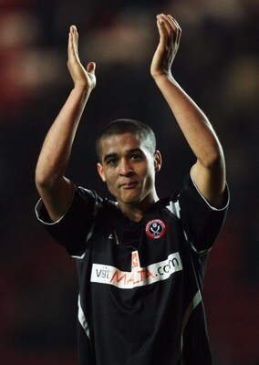 SOUTHAMPTON, UNITED KINGDOM - FEBRUARY 03: Kyle Naughton of Sheffield United acknowledges the fans after the Coca Cola Championship match between Southampton and Sheffield United at St. Mary's Stadium on February 3, 2009 in Southampton, England.  (Photo b