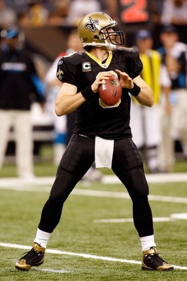 NEW ORLEANS - DECEMBER 28:  Quarterback Drew Brees #9 of the New Orleans Saints drops back to pass during the game against the Carolina Panthers on December 28, 2008 at the Superdome in New Orleans, Louisiana.  (Photo by Chris Graythen/Getty Images)