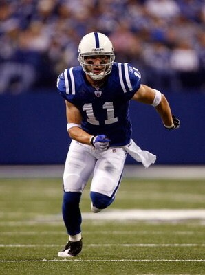INDIANAPOLIS - NOVEMBER 16:  Anthony Gonzalez #11 of the Indianapolis Colts runs his route against the Houston Texans during the game at Lucas Oil Stadium on November 17, 2008 in Indianapolis, Indiana.  (Photo by Harry How/Getty Images)